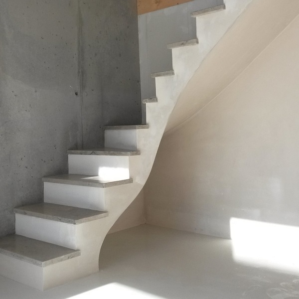 Escalier  en pierre grise du Jura sur voute sarrasine